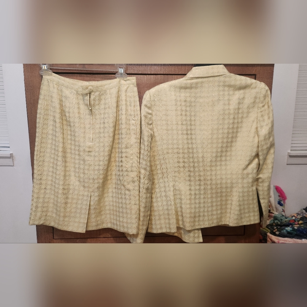 A woman's Albert Nipon dress suit